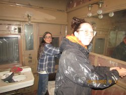 IMG 2581 Our Mother and Daughter team employees of Sandi and Jessie are working on the paint removal in the mens bathroom. 