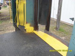 newly installed gate with bright yellow paint 4-24-2009