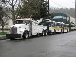 The coach being towed to the rail yard.  (03/03/2008)
