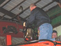 John F & Gerry installing bell