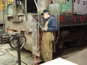 Roger B. grinding welds in step well