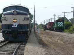 BN1 loads as the 5383 shoves west, and 9911A arrives at East Union.