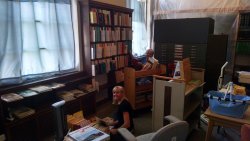 Volunteers Jan Galayda and Julie Piesciuk sort through the "for sale" extra books at the Strahorn Library 08/23/2015.