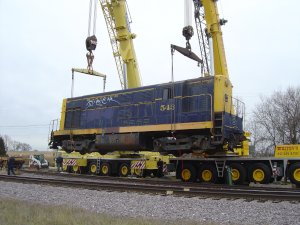 543 about to be lowered onto the track.