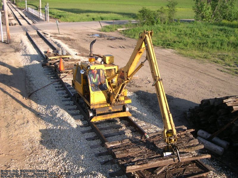 Adam and the tie crane at work unloading ties at Johnson siding. 