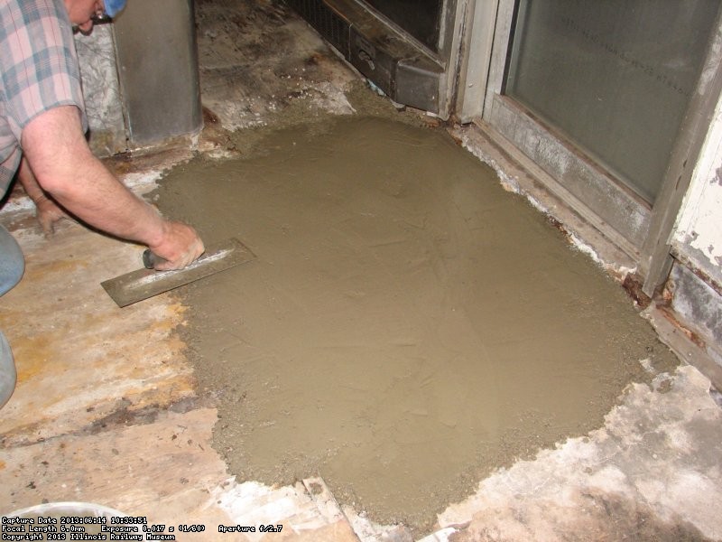 Mike Baksic troweling the area in front of the Birmingham galley door.