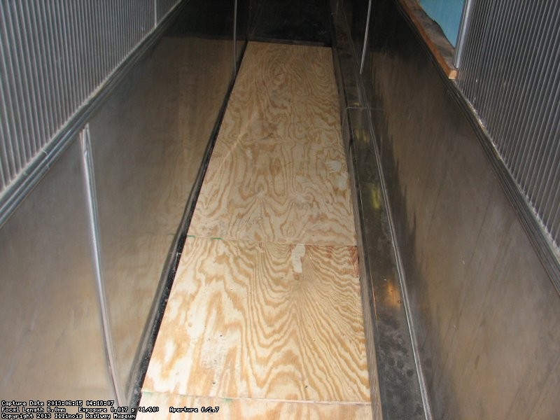 New plywood was laid in the hall over the sealant.