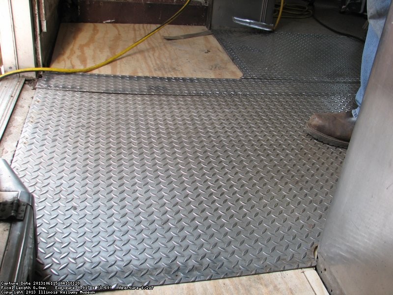 Corrugated steel was relaid over the new plywood.