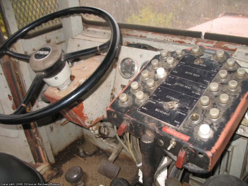 Brush cutter controls. This controls the main boom, outter boom, cutting head, boom in or out, and pivot forward and back. TWH PHOTO
