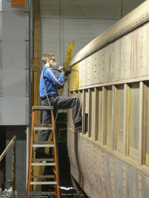Kevin needlechipping the last of the letter board on the 'South' side of the car.