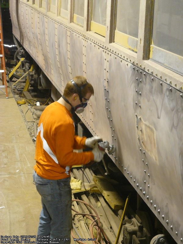 Eric wire wheeling around all the rivets.