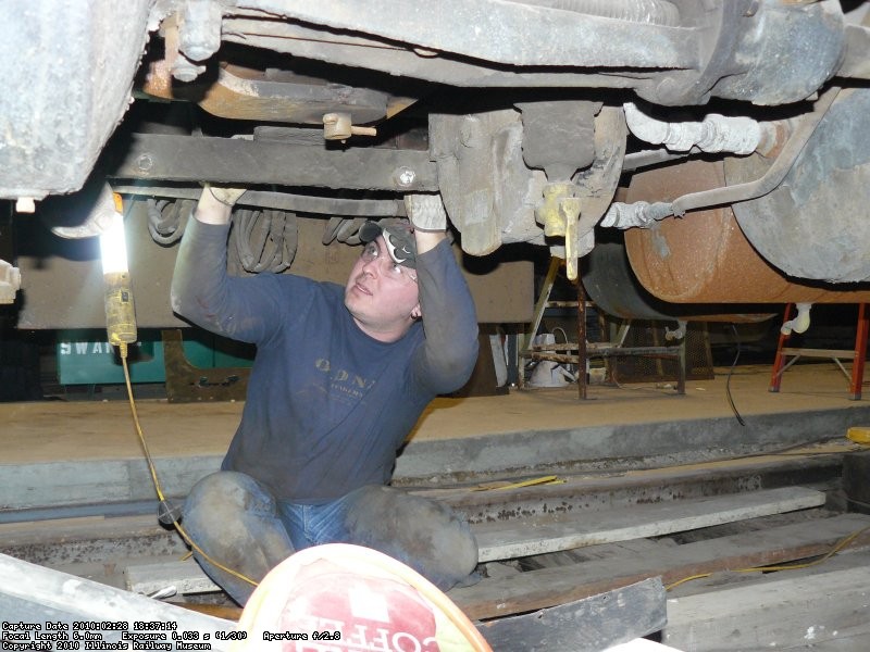 Jeron working on reconnecting some brake rigging.