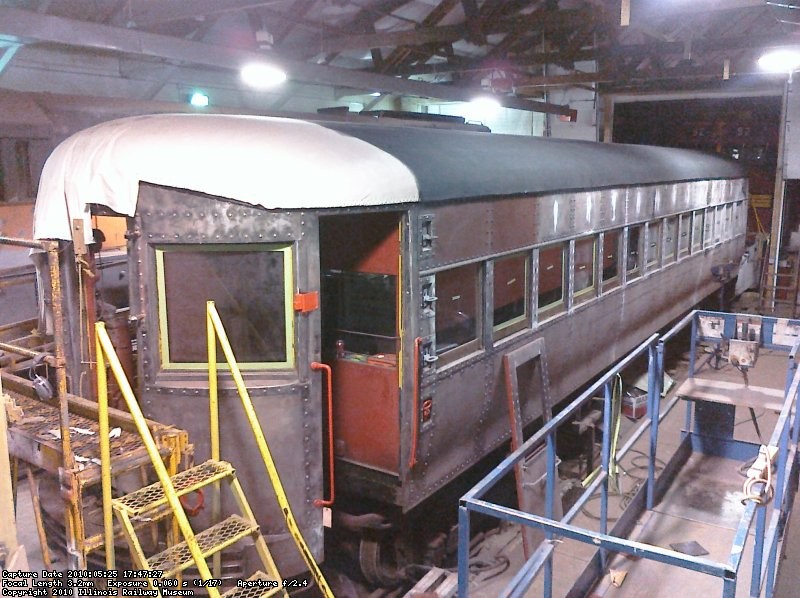 a few coats of canvas sealing paint has been applied to most of the roof.
