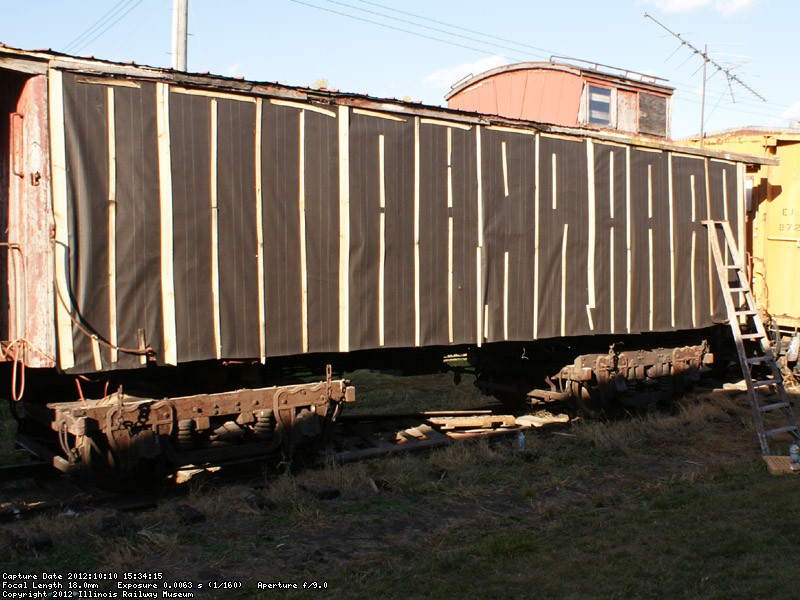 We covered it with tarpaper and will apply steel siding in spring to preserve it for future restoration.