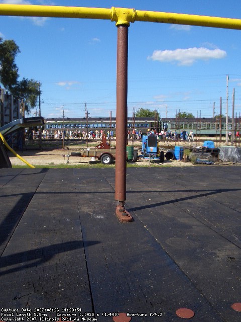 08.26.07 - TWO OF THE HANDRAIL SUPPNRT POSTS HAD FAILED AND HAD BROKEN AT THE THREADS.  KIRK WARNER RETHREADED THE PIPES AND REMOVED THE OLD BROKEN PIECES FROM THE TEES.  ROD TURNER AND VICTOR HUMPRHEYS REMOVED THE OLD WELD FROM THE BRACKETS THAT BOLT THE PIPES TO THE DECKS.  THE BRACKETS WILL NOW BE REWELDED TO THE HANDRAIL SUPPORT PIPES.