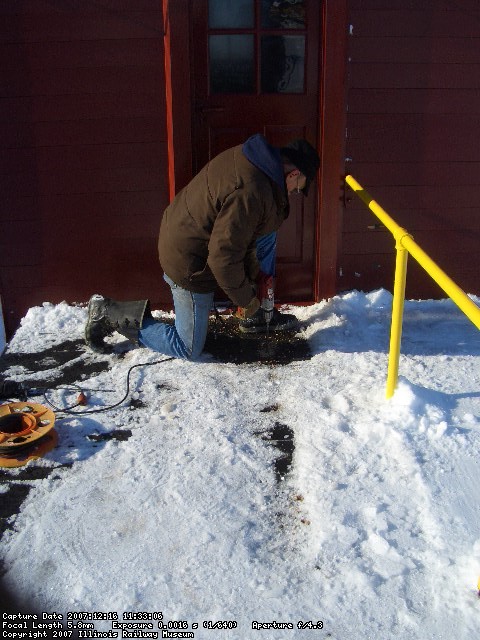 12.016.07 - VICTOR HUMPHREYS IS DRILLING THE FULL SIZE HOLES FOR THE TIMBER BOLTS.