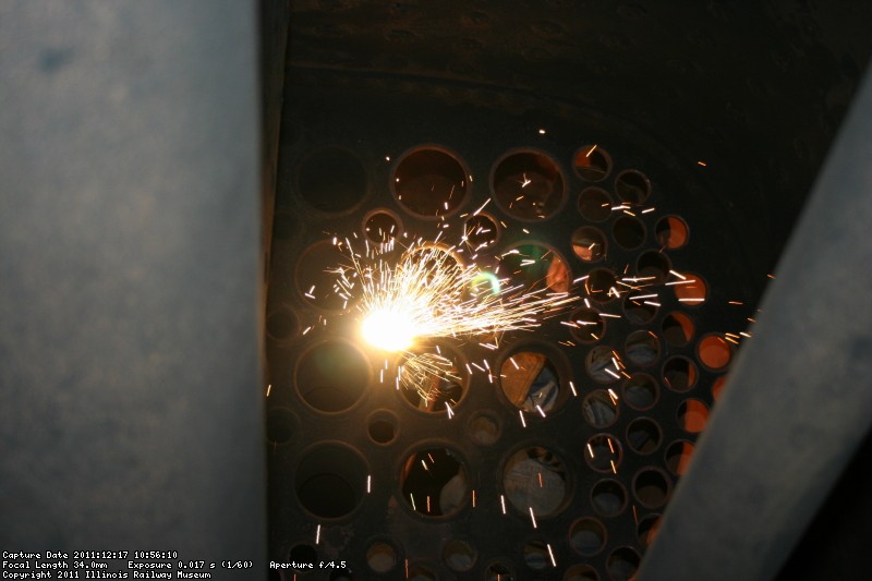 Flame cutting a fire tube end