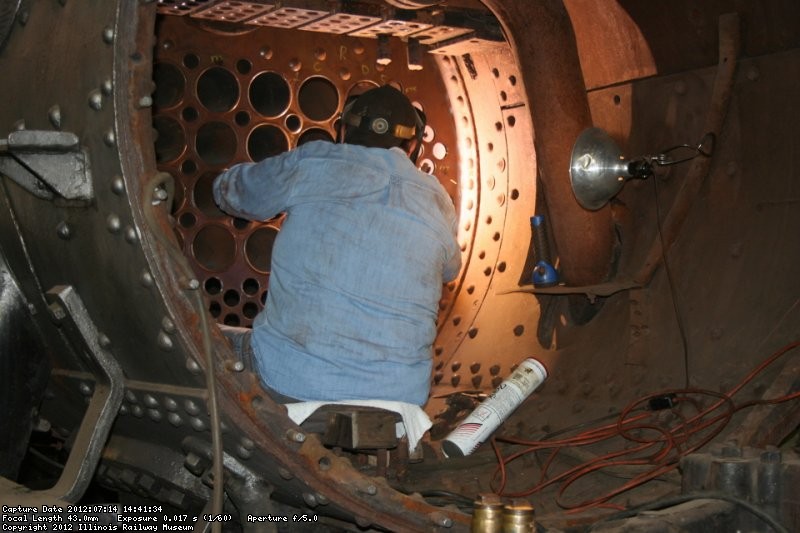 Dennis welds the tube sheet