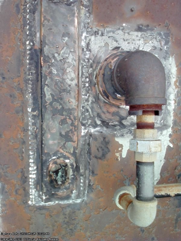 Area of leak identified 5/25/13 - above refrigerator