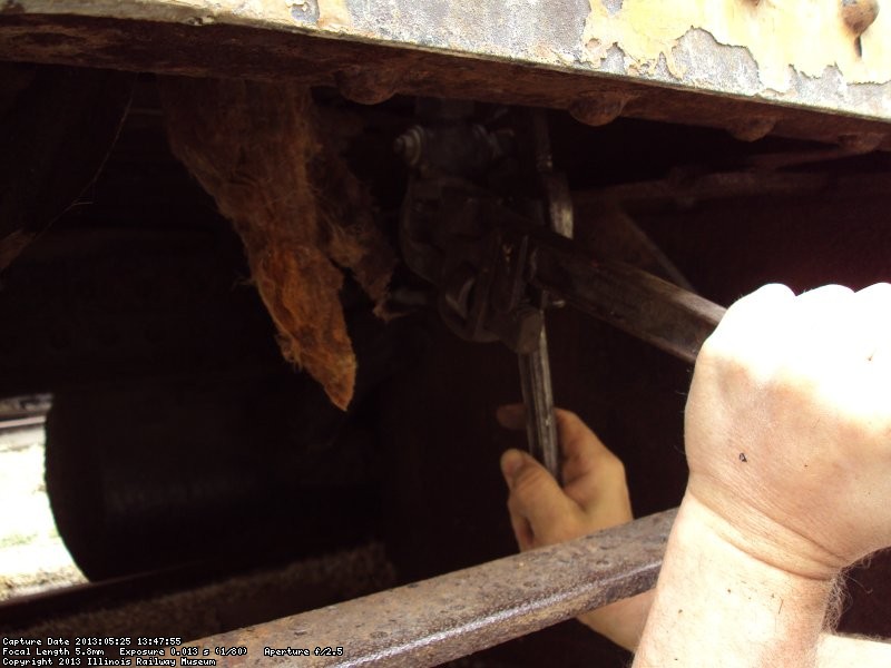 Chuck Trabert used two wrenches to open the boiler drain 