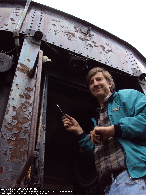 Larry Kuehn installing one of the jelly jar lights on the rear