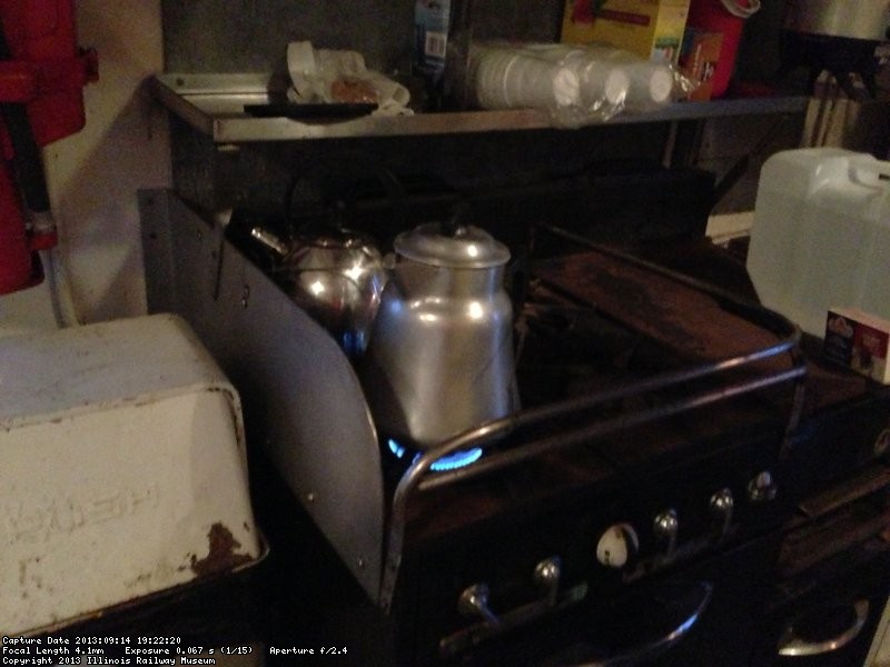 Buzz Morisette making coffee with the old percolator coffee pot on the propane stove. 9/14/13.