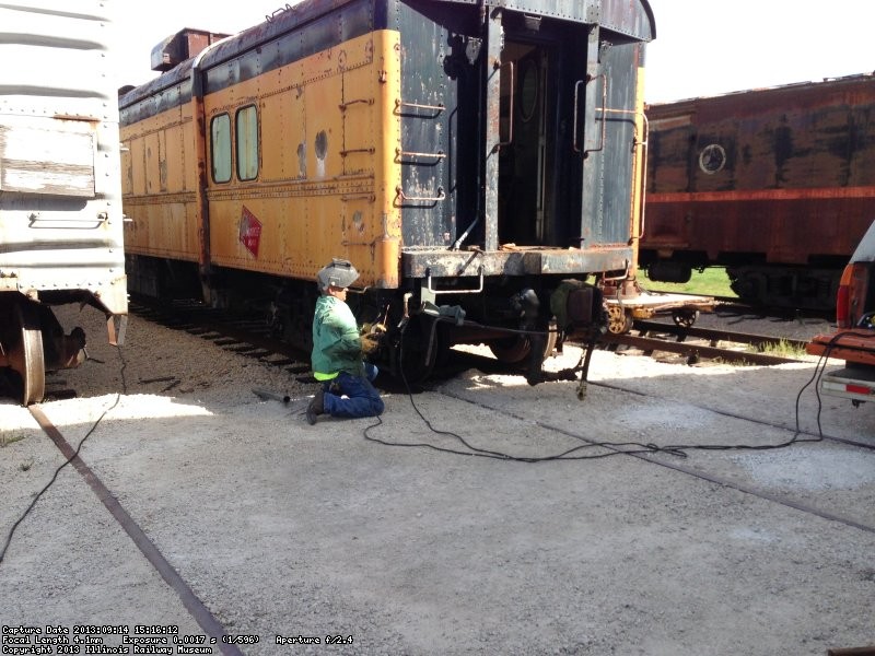 Welding the cut lever bracket back on in Yard 11. The Diesel Dept guys straightened it out for us. 9/14/13.