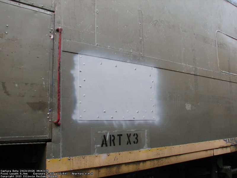 Patch in place on repair of Exhibit Car exterior