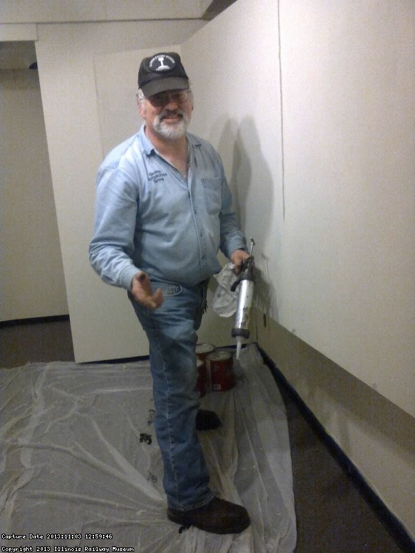 Mike Baksic caulking seams in the 2nd Exhibit Car 11/03/13