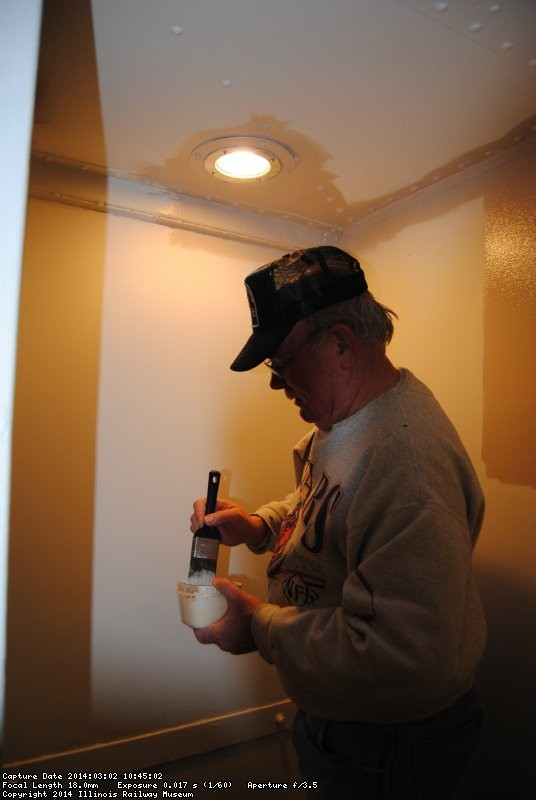 Kevin began applying the 1st coat of tan paint to the vestibule