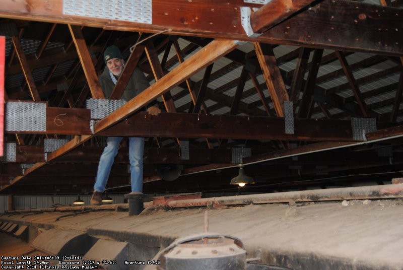 Buzz on the Ely roof checking his pilot holes
