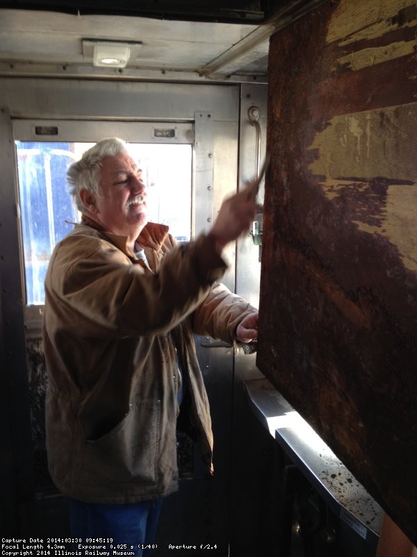 Mark Gellman scraping a panel in the RDC