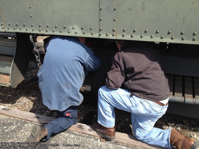 Ray Mormann and Mike Baksic checking the wheels on Lackawanna 561
