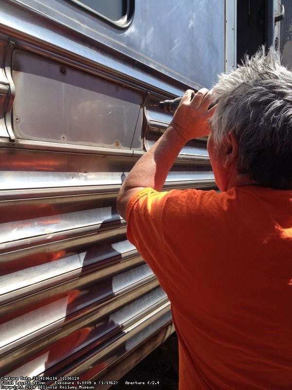 Mark Gellman drilling out pop rivets - Photo by Michael McCraren