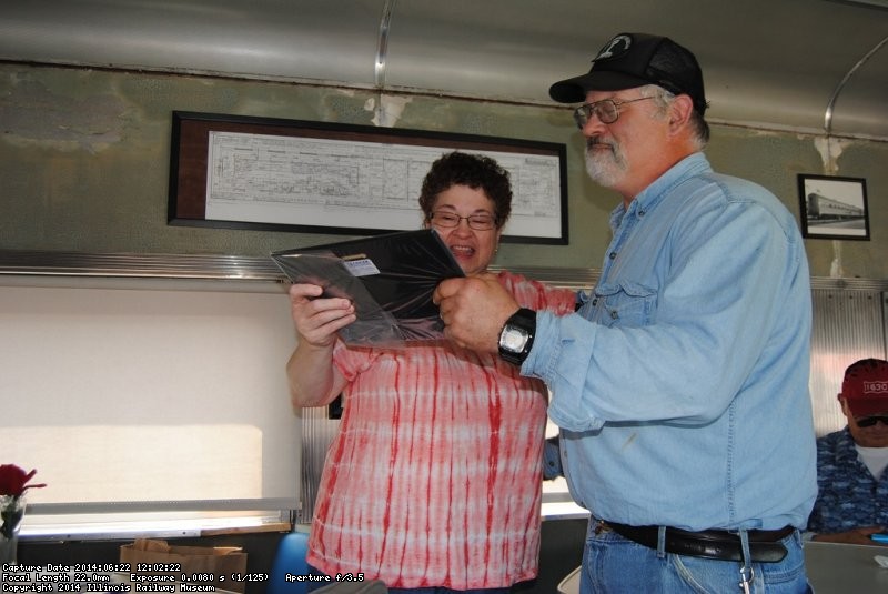 Michael Baksic presents a plaque to Susan Stepek - Photo courtesy of Shelly Vanderschaegen