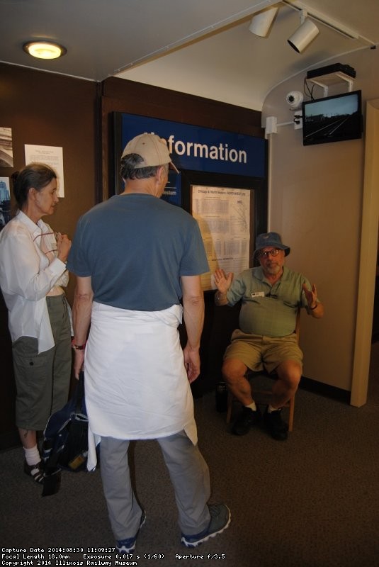 Ken Kosan talks with visitor in the 1st Exhibit Car - Photo by Shelly Vanderschaegen