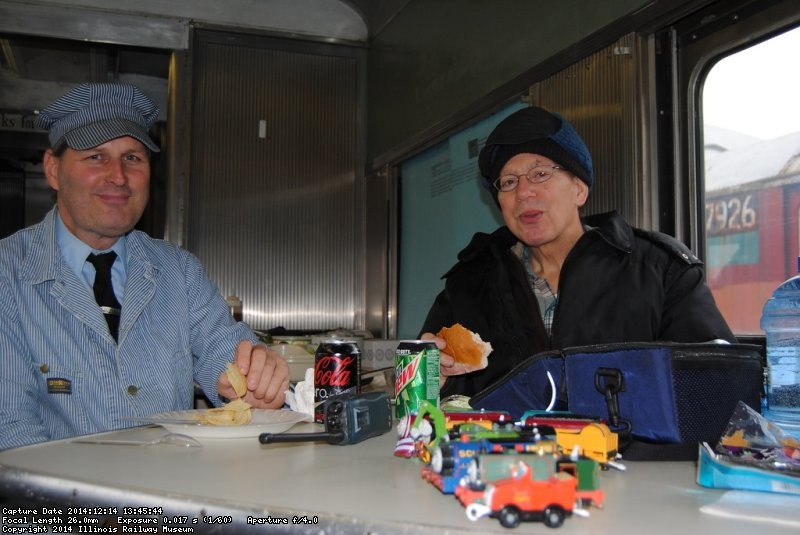 Happy Holidays Railway crew members Jerry Saunders and Jim West joined in the fun - Photo by Shelly Vanderschaegen