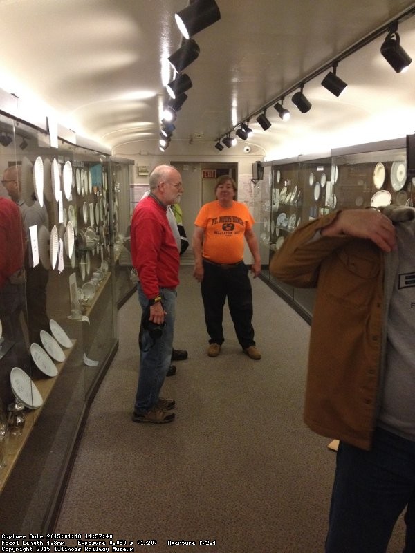 Jon Habegger, Paul Matchett and Mark Gellman discuss one of the displays - Photo by Michael McCraren