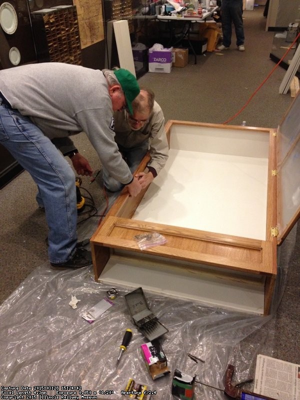 Kevin and Buzz installing locks - Photo by Michael McCraren