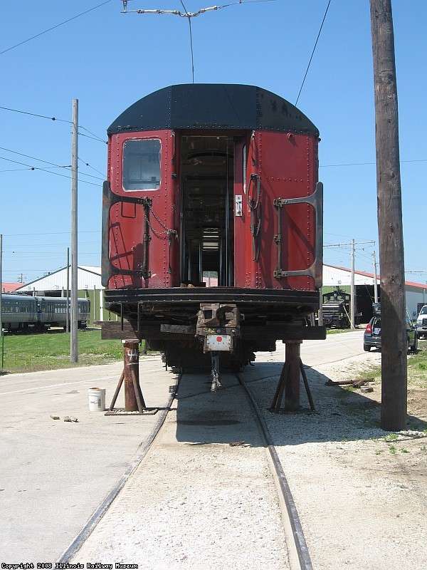 NYC 7927 on stands awaiting a new truck