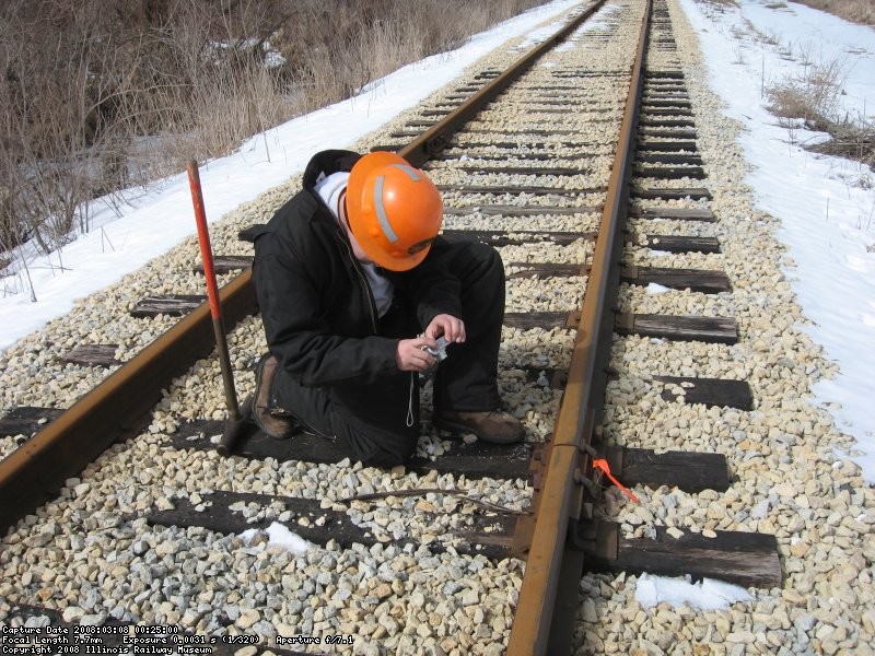 Frank taking picture of defect