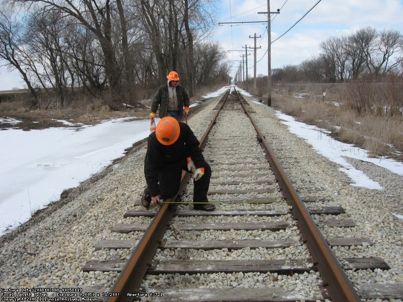 Andy inspecting joint while Frank takes gage measurement