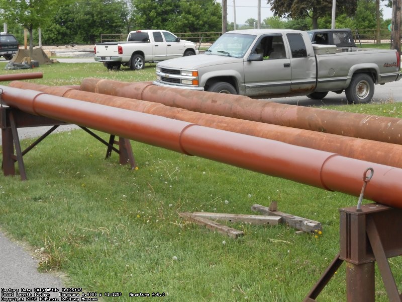 Steel strain poles from Dayton being cleaned and primed.