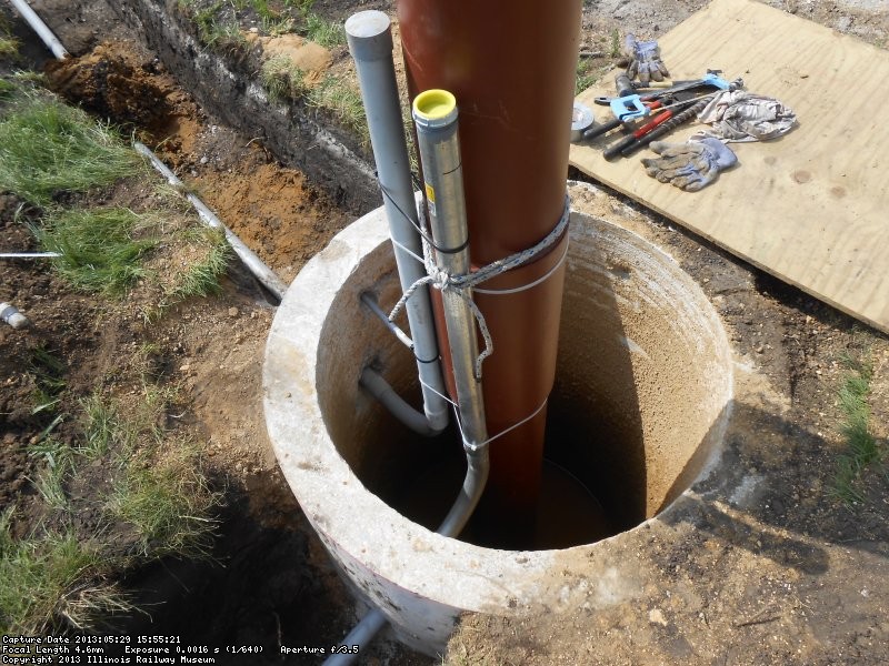 Pole set and conduit risers installed-ready for concrete.