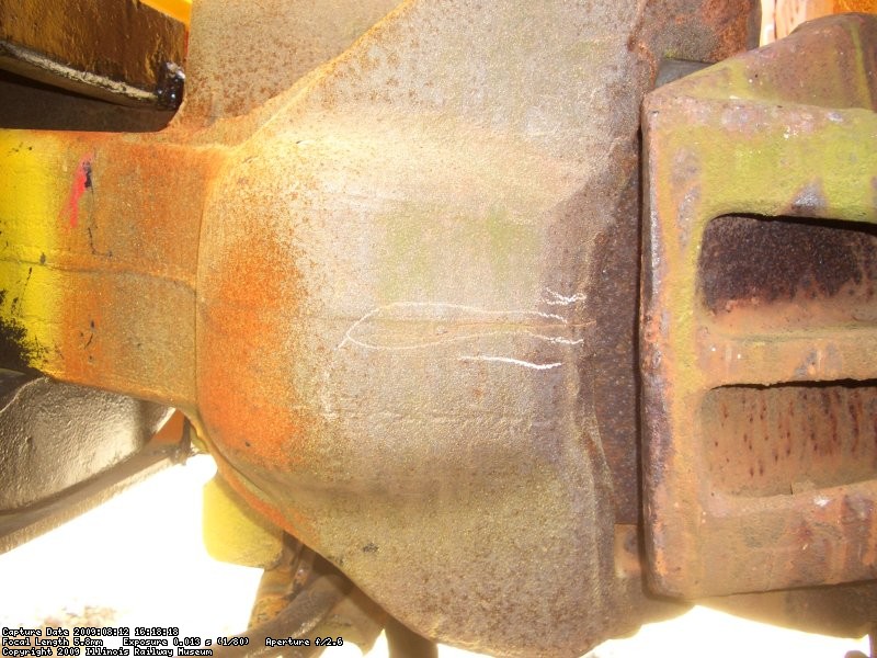 08.12.09 - KIRK WARNER DISCOVERED A CRACK, CIRCLED IN WHITE, IN THE COUPLER.  THE COUPLER WILL HAVE TO BE REPLACED PRIOR TO THE CAR ENTERING SERVICE. 
