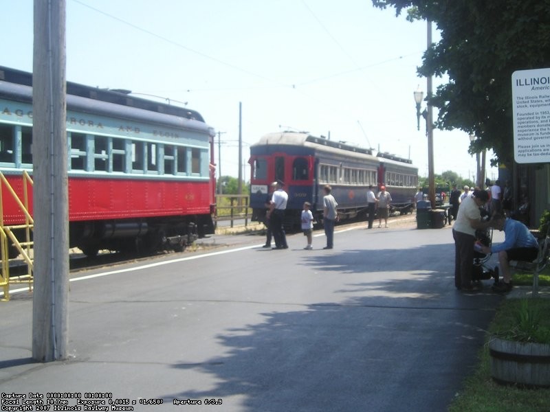 Train 308, with cars 308 and 309, and train 431 sit at Wheaton waiting for their 12:05 departure to Forest Park