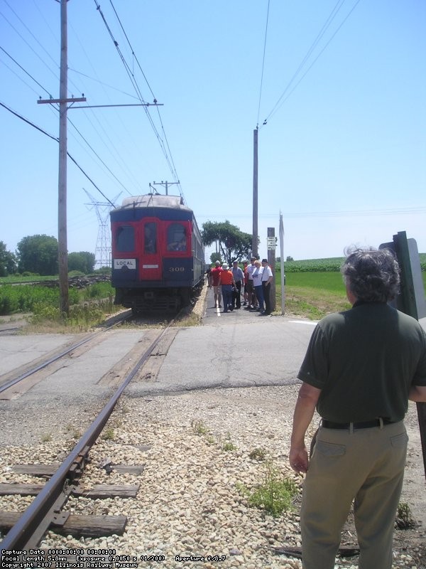 Arriving at Forest Park, train 308 discharges its passengers.