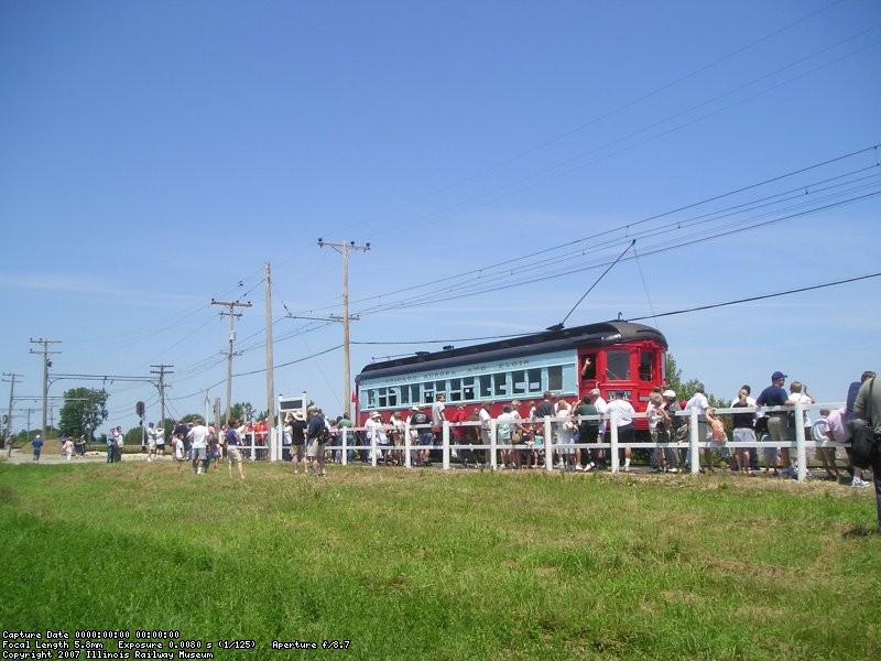 I don't know exactly what was said by the gentleman in the hat, but car 431 immediately departed westbound back to Wheaton without loading passengers.