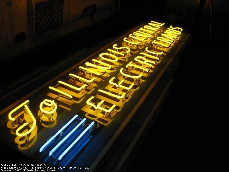 The restored IC electric sign in the B&G shop before mounting on barn 6.