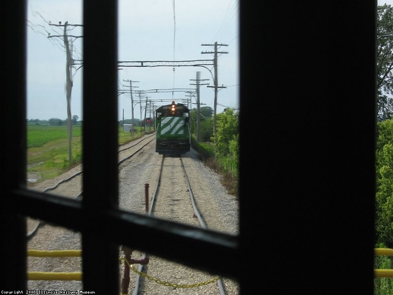 BN 5383 through the clear glass on the Rock Island crummy